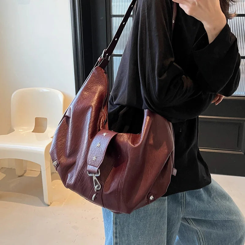 ANGE – Sac à main besace de cours en cuir bordeaux et burgundy chic et pratique.