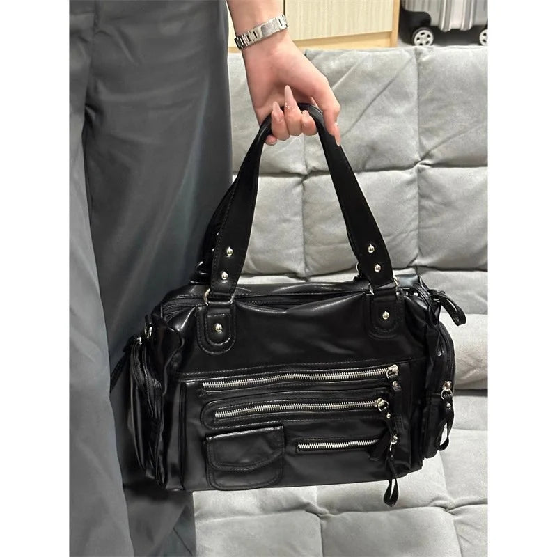 sac à main cuir rétro noir BIANCA avec multiples poches à fermetures éclair, élégant et pratique pour femme active