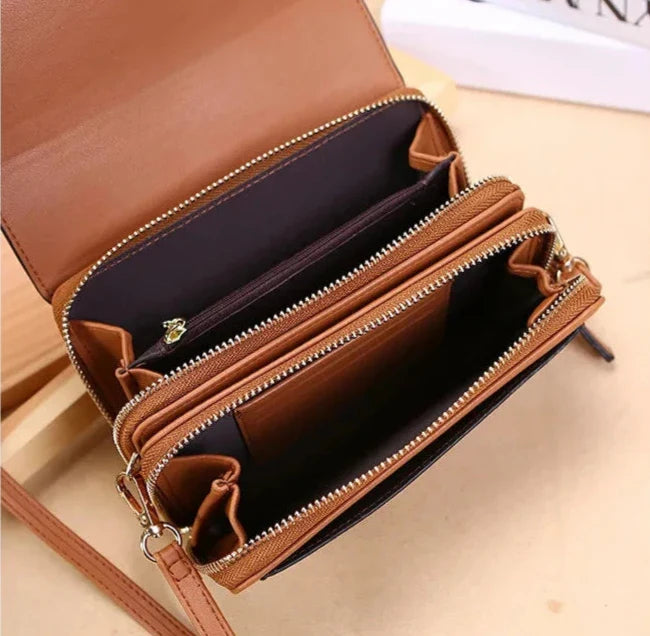 Sac à main CASSIE en cuir synthétique, bandoulière ajustable, avec rabat, compartiments et poches pour organiser vos essentiels avec style et praticité, VUE INTERIEURE.