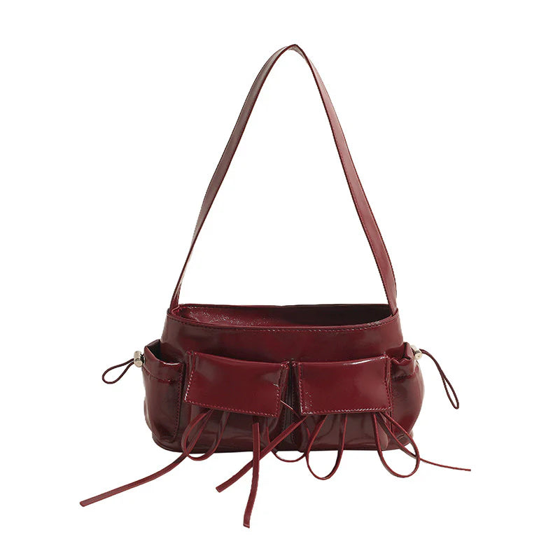 Sac à main Fiona en cuir vernis bordeaux avec bandoulière, spacieux et raffiné, idéal pour ordinateur, cahiers et essentiels du quotidien.