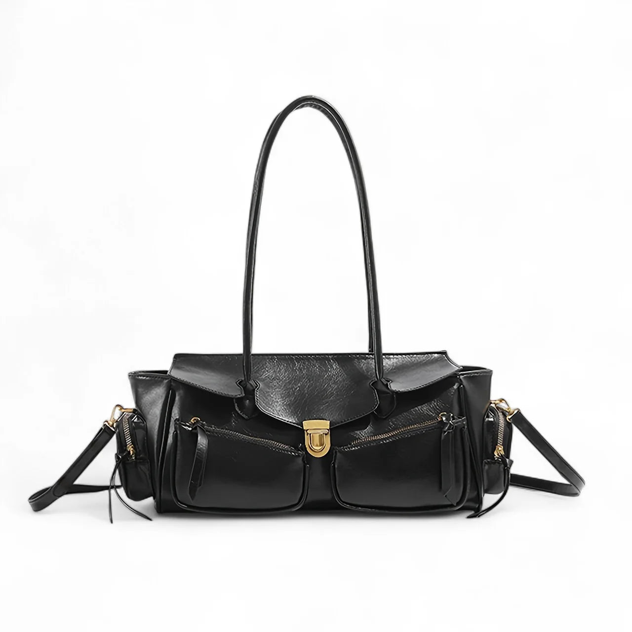 Sac à main Jila en cuir, spacieux et structuré, idéal pour transporter téléphone, portefeuille et accessoires avec style et praticité.