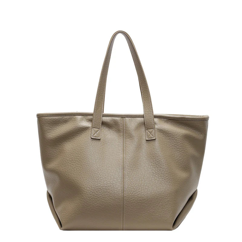 Sac à main KIM en cuir synthétique greige, moderne et pratique, grand sac tote bag avec intérieur spacieux et finitions soignées, parfait pour le quotidien et le travail.