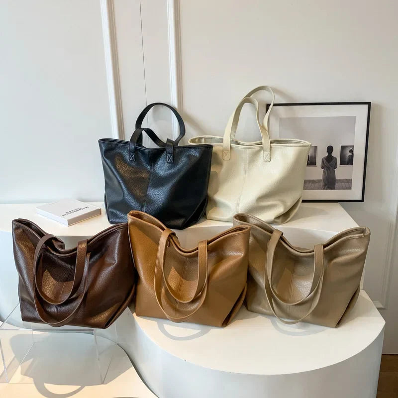 Sac à main KIM en cuir synthétique, moderne et pratique, grand sac tote bag avec intérieur spacieux et finitions soignées, parfait pour le quotidien et le travail.