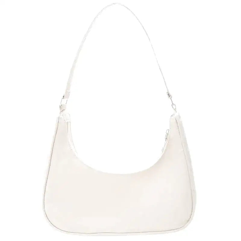 Petit sac à main MELIA en cuir vegan souple blanc, format compact avec design chic et minimaliste, idéal pour une sortie élégante.