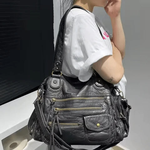 Sac à main MELANIA en cuir vintage noir vegan avec multiples poches élégantes et format spacieux