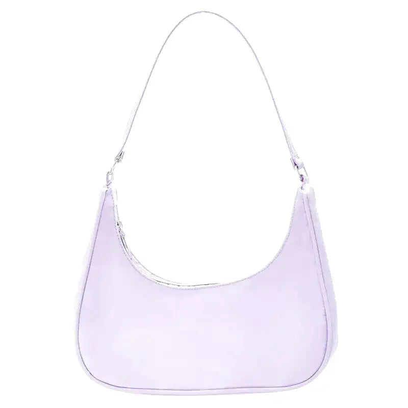 Petit sac à main MELIA en cuir vegan souple violet, format compact avec design chic et minimaliste, idéal pour une sortie élégante.