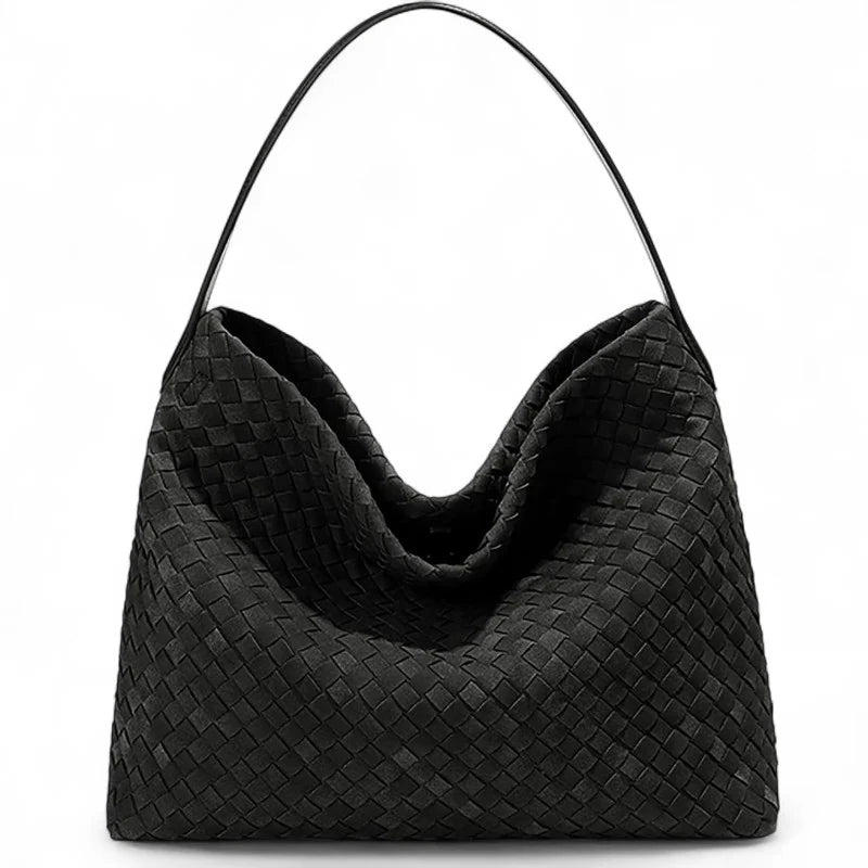 Découvrez MIKA, sac cabas tissé noir grand format pour femmes actives : chic, pratique, compatible ordinateur 15” et 100% vegan. Parfait au quotidien !