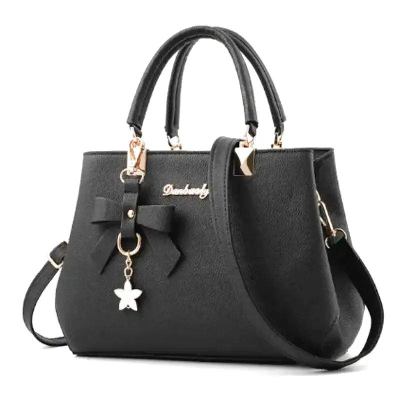 Sac à main PRILLA spacieux en cuir grainé vegan avec bandoulière ajustable, format chic et pratique pour femme moderne.