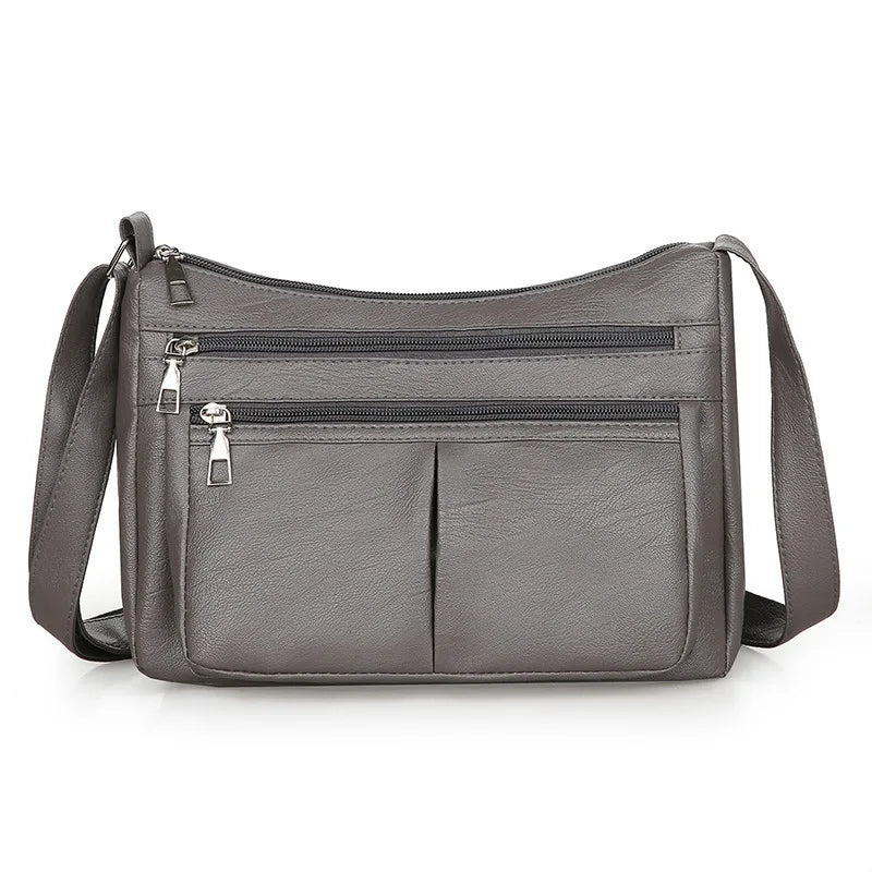 Sac à main Rita en cuir gris multipoches avec bandoulière, spacieux et structuré, parfait pour ordinateur, cahiers et accessoires essentiels du quotidien