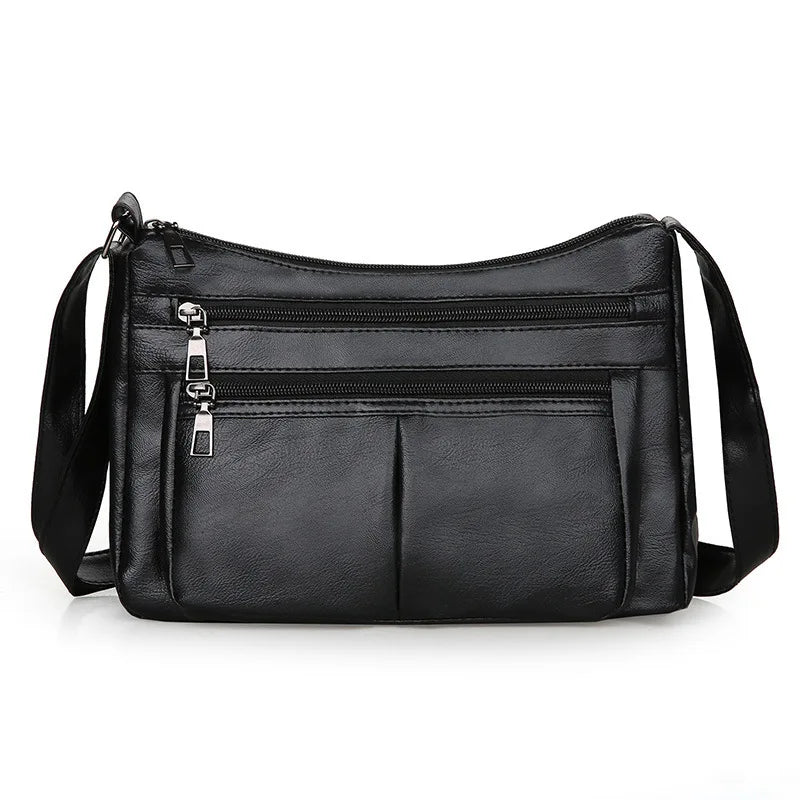 Sac à main Rita en cuir NOIR multipoches avec bandoulière, spacieux et structuré, parfait pour ordinateur, cahiers et accessoires essentiels du quotidien.