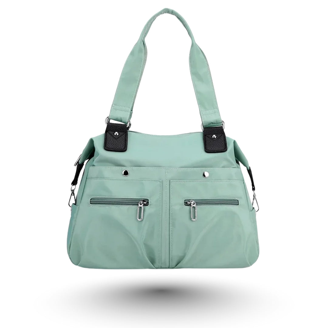 ROMY – Sac multi-poches vert pastel, tendance et fonctionnel, parfait pour étudiantes et professionnelles.