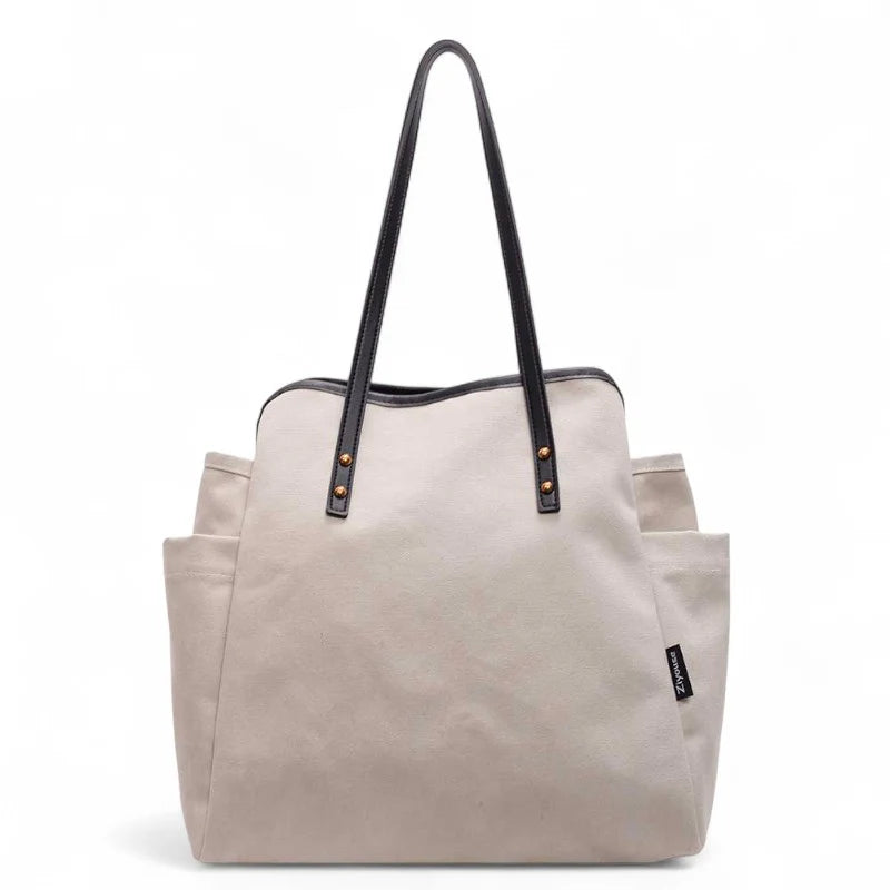 Grand sac cabas en tissu blanc Selva, spacieux et pratique pour ordinateur, dossiers et effets personnels au quotidien.