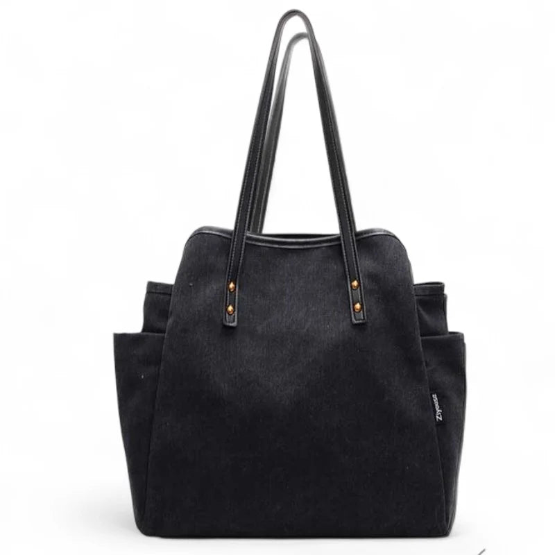 Grand sac cabas en tissu noir Selva, spacieux et pratique pour ordinateur, dossiers et effets personnels au quotidien.