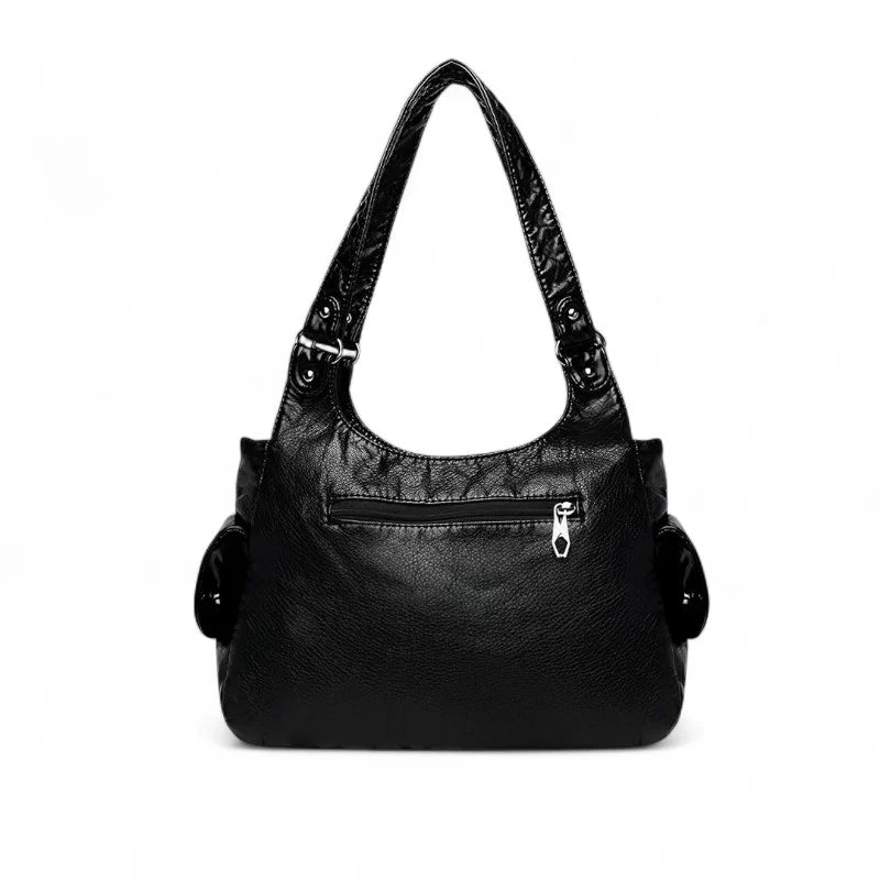 Grand sac à main femme VICTOIRE en cuir  noir vegan élégant et structuré, spacieux et organisé, parfait pour transporter ordinateur, cahiers et essentiels avec style et praticité.